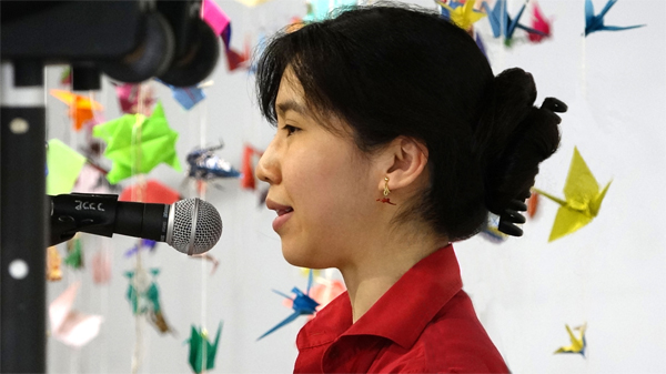 Mui-Ling Teh giving her speech during the exhibition 'Origami - The Art of Paper Folding' at the Japanese Canadian Cultural Centre