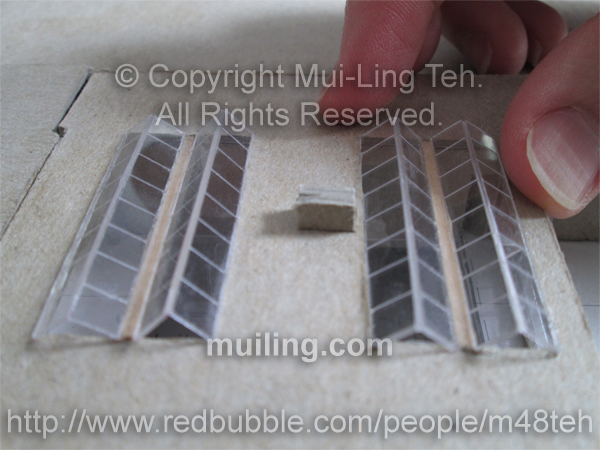 A pair of skylights, with scored mullions, made of  acrylic glass by Mui-Ling Teh.